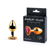 Золотистая анальная пробка с малиновым кристаллом-сердечком - 7 см. - Anal Jewelry Plug - купить с доставкой в Новошахтинске