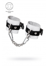 Бело-черные кожаные наручники с одним ремешком с люверсами - Pecado - купить с доставкой в Новошахтинске