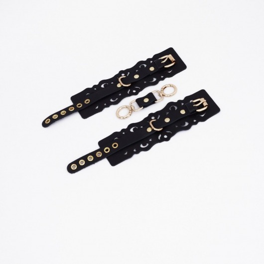 Черные кожаные наручники с узорами и золотистой фурнитурой - Crazy Handmade - купить с доставкой в Новошахтинске